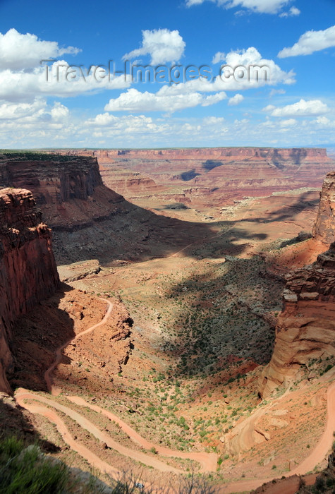 usa1644: Canyonlands National Park, Utah, USA: Shafer Canyon with mesas in background - seen from Shafer Trail Road, Island in the Sky district - cumulus clouds - switchbacks - photo by M.Torres - (c) Travel-Images.com - Stock Photography agency - Image Bank