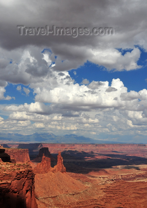 usa1648: Canyonlands National Park, Utah, USA: buttes, mesas, rock pillars and clouds - Shafer Canyon from Island in the Sky district - La Sal mountains, part of the Rockies, in the background - photo by M.Torres - (c) Travel-Images.com - Stock Photography agency - Image Bank