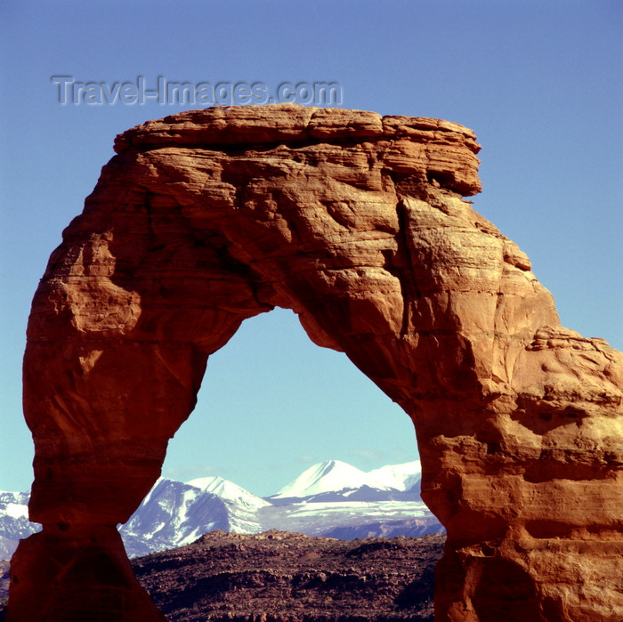 usa1651: Arches National Park, Utah, USA: La Sal Mountains and Delicate Arch, formed of Entrada Sandstone - photo by J.Fekete - (c) Travel-Images.com - Stock Photography agency - Image Bank