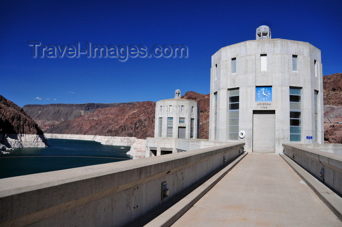 usa1879: Hoover Dam, Mohave County, Arizona, USA: clock with Arizona time on a water intake tower against the Black Canyon of the Colorado River - photo by M.Torres - (c) Travel-Images.com - Stock Photography agency - Image Bank
