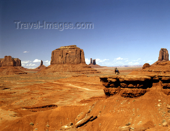 usa188: USA - Monument Valley (Arizona): horizon - Navajo girl on horse back standing over a cliff - landscape - the valley lies within the range of the Navajo Nation Reservation - accessible from Highway 163 - the Navajo name for the valley is Tsé Bii' Ndzisgaii - Cutler Red siltstone buttes - photo by J.Fekete - (c) Travel-Images.com - Stock Photography agency - Image Bank