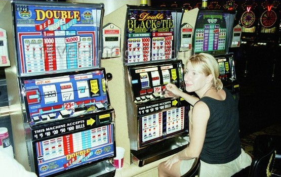 usa190: Las Vegas (Nevada): casino life - at the slot machines - one armed bandits - Kasino - photo by J.Kaman - (c) Travel-Images.com - Stock Photography agency - Image Bank