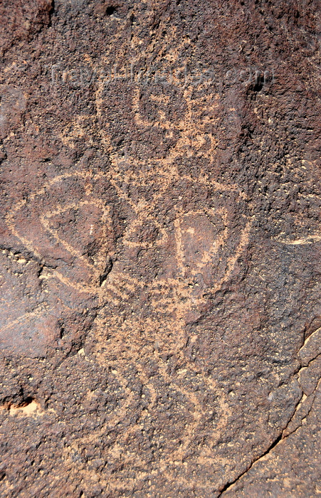 usa1981: Albuquerque, Bernalillo County, New Mexico, USA: Petroglyph National Monument - Rinconada Canyon - image of a dancing Indian carved on the igneous rock - photo by M.Torres - (c) Travel-Images.com - Stock Photography agency - Image Bank