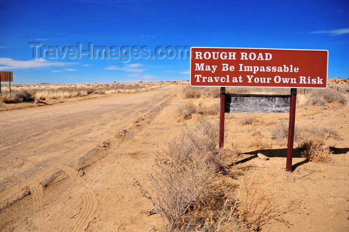 usa1993: Chaco Canyon road, San Juan County, New Mexico, USA: road sign - 'Rough Road. May be impassable. Travel at your own risk.' - photo by M.Torres - (c) Travel-Images.com - Stock Photography agency - Image Bank