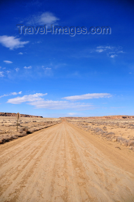 usa1996: Chaco Canyon National Historical Park, New Mexico, USA: red dirt road and blue sky - photo by M.Torres - (c) Travel-Images.com - Stock Photography agency - Image Bank