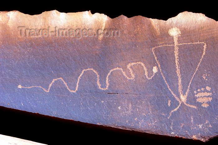 usa2241: Moab, Utah, USA: petroglyphs - snake and man - Sevenmile Canyon - photo by B.Cain - (c) Travel-Images.com - Stock Photography agency - Image Bank