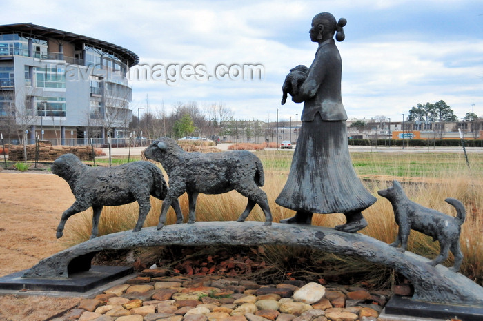 usa2357: Little Rock, Arkansas, USA: 'sculpture Homeward Bound' - Navajo girl crosses a bridge with a gift of animals - reflective of the hope and self-reliance - Heifer International headquarters - artist Allan Houser - photo by M.Torres - (c) Travel-Images.com - Stock Photography agency - Image Bank