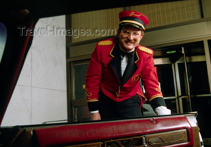 usa581: Dallas, Texas, USA: welcome to the Fairmont Hotel - doorman opens the car door - photo by C.Lovell - (c) Travel-Images.com - Stock Photography agency - Image Bank