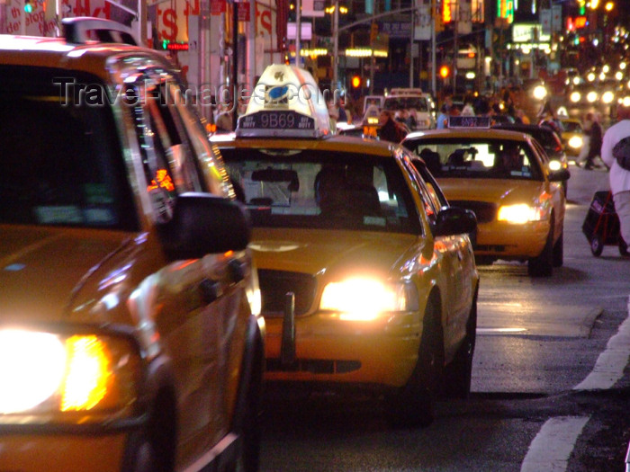 usa626: Manhattan (New York City): yellow cabs at Times Square - nocturnal - New York taxis - photo by M.Bergsma - (c) Travel-Images.com - Stock Photography agency - Image Bank