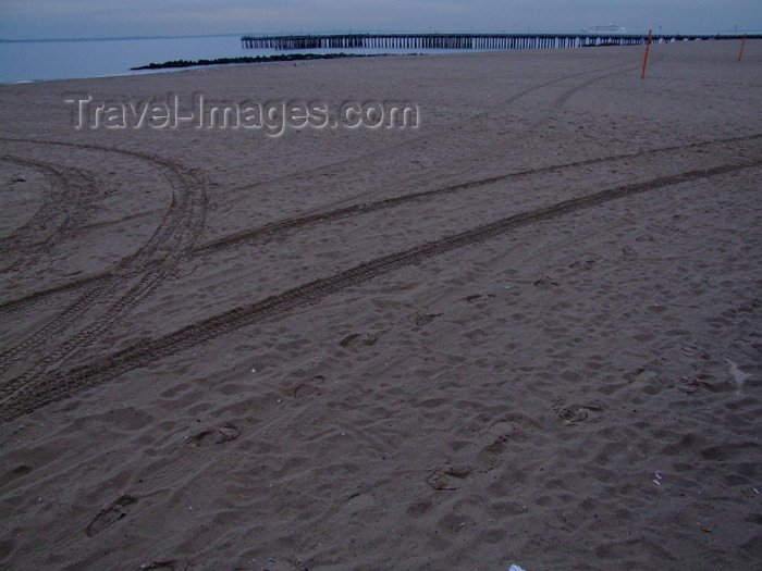 usa675: New York City, USA: Coney Island - beach at dusk - pier and tire marks on the sand - photo by M.Bergsma - (c) Travel-Images.com - Stock Photography agency - Image Bank