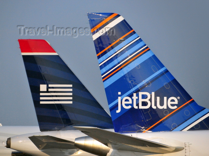 usa704: Charlotte, North Carolina, USA: aircraft tails,JetBlue and US Airways, Charlotte Douglas International Airport - photo by M.Torres - (c) Travel-Images.com - Stock Photography agency - Image Bank