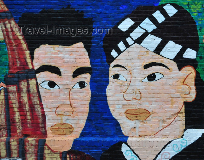 usa771: Kansas City, KS, USA: faces in a Hmong mural - 'Facing the Past, Looking to the Future: A Kansas Hmong Storycloth Mural' - 751 Minnesota Ave. - photo by M.Torres - (c) Travel-Images.com - Stock Photography agency - Image Bank