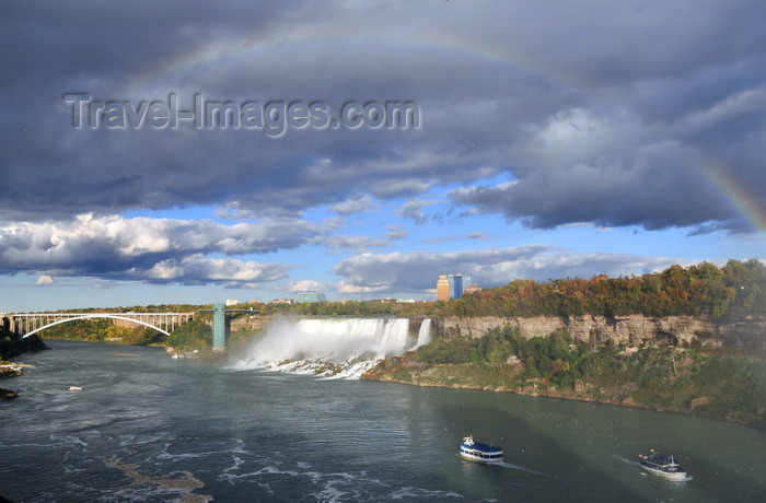 usa793: Niagara Falls, New York, USA: rainbow over the Niagara River - American Falls, Rainbow Bridge and Prospect Point Park observation tower - Goat Island scarp and Lady of the Mist boats - photo by M.Torres - (c) Travel-Images.com - Stock Photography agency - Image Bank