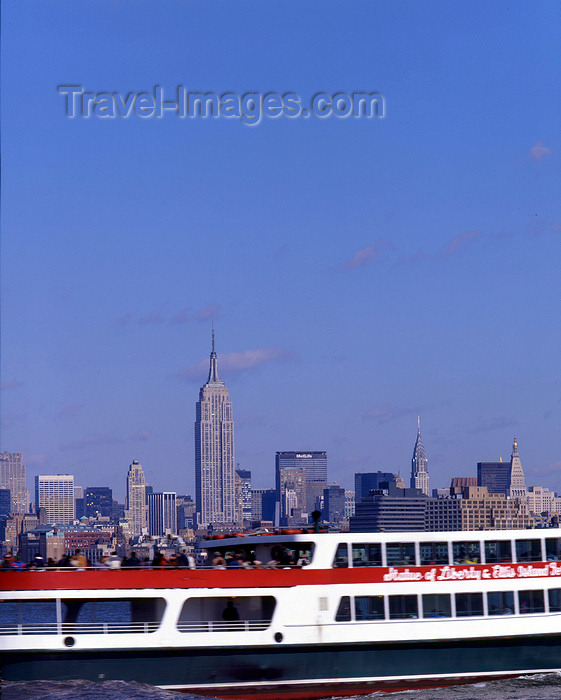 usa989: USA - Manhattan (New York): skyline and passing ferry - photo by A.Bartel - (c) Travel-Images.com - Stock Photography agency - Image Bank