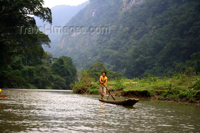 vietnam157: Ba Be National Park - Vietnam: river scene - man on a long dug-out canoe - photo by Tran Thai - (c) Travel-Images.com - Stock Photography agency - Image Bank