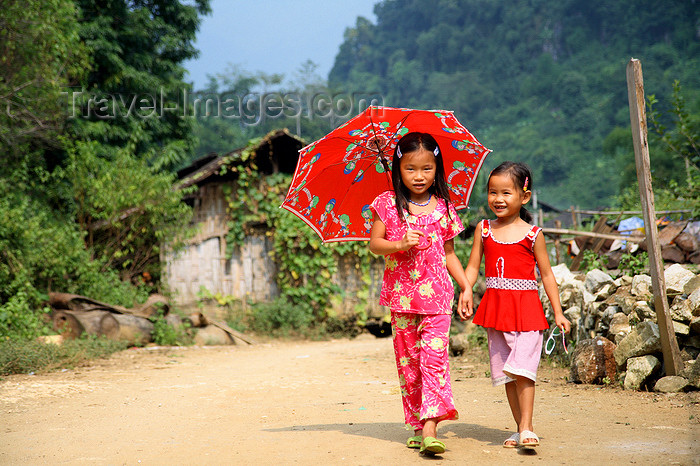 file: vietnam158 - Ba Be National Park - Vietnam: cute girls with umbrella 