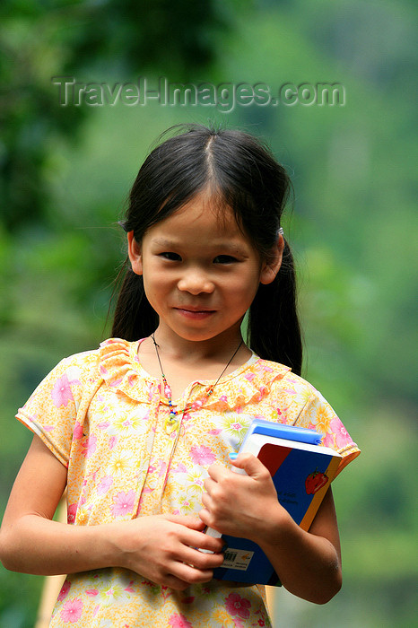 vietnam161: Ba Be National Park - Vietnam: school girl with her books  - photo by Tran Thai - (c) Travel-Images.com - Stock Photography agency - Image Bank