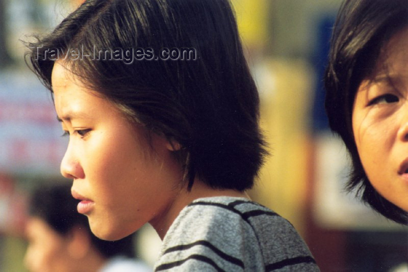 vietnam33: Hanoi - Vietnam: faces in the crowd - photo by Nacho Cabana - (c) Travel-Images.com - Stock Photography agency - Image Bank