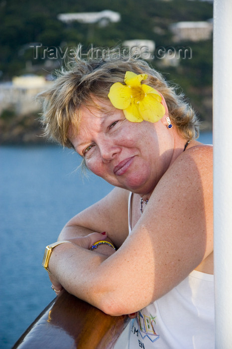 virgin-us55: USVI - St. Thomas: tourist on a cruise ship - flower on the hair - photo by David Smith - model released - (c) Travel-Images.com - Stock Photography agency - Image Bank