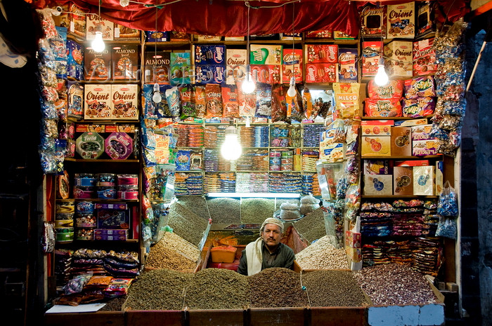 yemen38: Sana'a / Sanaa, Yemen: Market stall at night - dry fruits, biscuits and sweets - photo by J.Pemberton - (c) Travel-Images.com - Stock Photography agency - Image Bank