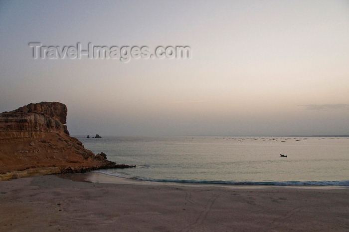 yemen55: Ras Sharma, Hadhramaut Governorate, Yemen: turtle sanctuary beach with fishing boats - turtle tracks, beach, cove and cliffs - photo by J.Pemberton - (c) Travel-Images.com - Stock Photography agency - Image Bank