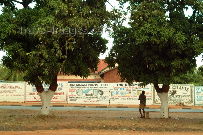 zambia12: Zambia - Livingstone: hanging out - walls with ads - photo by J.Banks - (c) Travel-Images.com - Stock Photography agency - Image Bank