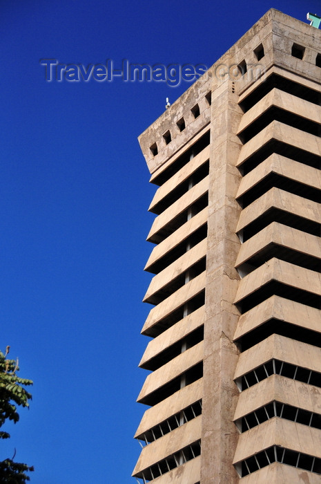 zambia17: Lusaka, Zambia: Society House, a skyscraper built in the 1970s with copper money, was gutted by a fire in the 1990s - a 20-storey extruded concrete concertina with a neo-oriental brutalist pagoda on top - will become a Holiday Inn - Cairo Road - Central Business District - photo by M.Torres - (c) Travel-Images.com - Stock Photography agency - Image Bank