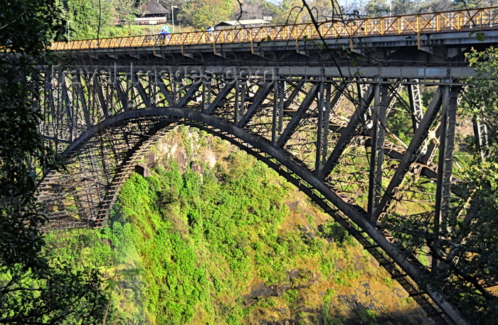 zimbabwe69: Victoria Falls, Matabeleland North, Zimbabwe: Victoria Falls Bridge - crosses the Zambezi River just downstream from Victoria Falls - spans the Second Gorge of the falls - single-span steel arch built in England by the Cleveland Bridge and Engineering Company, shipped via Mozambique - photo by M.Torres - (c) Travel-Images.com - Stock Photography agency - Image Bank