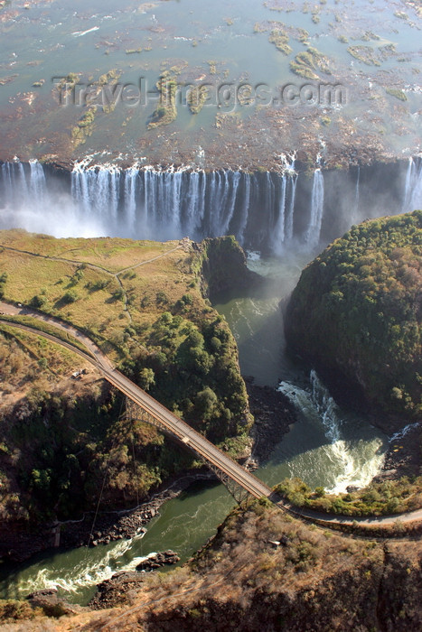 zimbabwe7: Victoria Falls - Mosi-oa-tunya, Matabeleland North province, Zimbabwe: the falls and the Zambesi bridge from the air - photo by R.Eime - (c) Travel-Images.com - Stock Photography agency - Image Bank