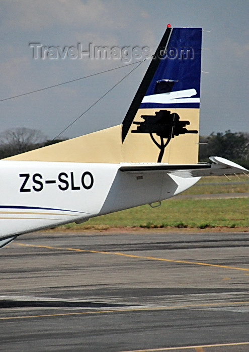 zimbabwe70: Victoria Falls, Matabeleland North, Zimbabwe: Solenta Aviation tree logo - tail of Cessna 208B Grand Caravan ZS-SLO cn 208B0485 - VFA - Victoria Falls Airport - photo by M.Torres - (c) Travel-Images.com - Stock Photography agency - Image Bank