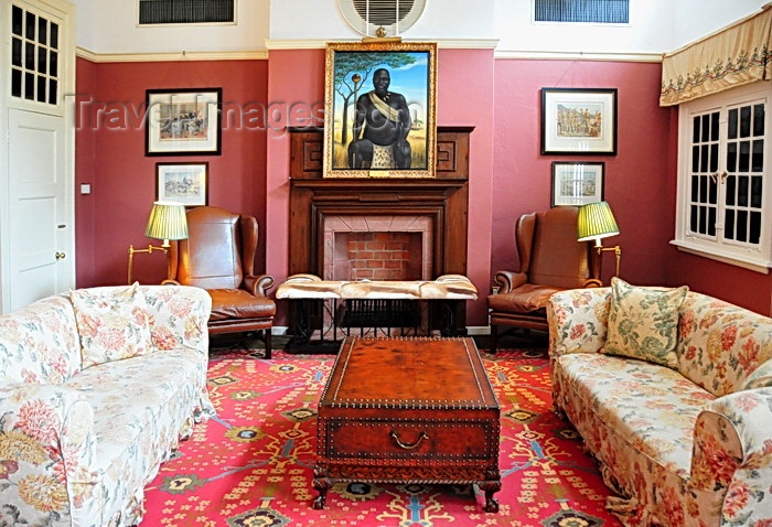 zimbabwe74: Victoria Falls, Matabeleland North, Zimbabwe: Victoria Falls Hotel - Bulawayo Room - fireplace with portrait of King Lobengula Khumalo of the Ndebele people - photo by M.Torres - (c) Travel-Images.com - Stock Photography agency - Image Bank