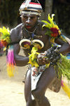 PNG - Papua New Guinea - Colorful male dancer, Tuam Island - photo by B.Cain