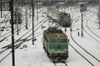 Poland - Krakow: trains entering the Railway station - snow - photo by M.Gunselman