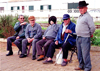 Portugal - Algarve - Alcantarilha (concelho de Albufeira): five old men at the railway station - cinco homens idosos - estao dos caminhos de ferro - photo by T.Purbrook