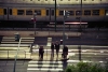 Lisbon: 24 de Julho av. - morning commuters near rail station - train - level crossing (photo by M.Gunselman)