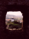 bidos, Portugal: windmill seen through a cannon hole in the walls / moinho de vento visto atravs de um buraco nas muralhas - photo by M.Durruti