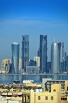 Doha, Qatar:  skyscrapers - West Bay skyline from Ras Abu Abboud St - old and new Doha - Al Bidda Tower, Palm Towers, Burj Qatar, Tornado Tower - photo by M.Torres