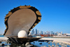 Doha, Qatar: Pearl and Oyster Fountain, Al Corniche, probably the most photographed place in Doha - West Bay skyline in the background - photo by M.Torres