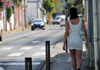 Saint-Denis, Runion: local charm - woman walking along Rue Flix Guyon - photo by M.Torres