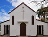 Port Mathurin, Rodrigues island, Mauritius: Catholic Church - white faade with cross - photo by M.Torres