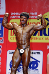 Russia - Krasnodar: male bodybuilder - bodybuilding competition - Russian woman - muscles - Fisicoculturismo, Kehonrakennus, Culturisme, Kulturystyka, Culturismo (photo by Vladimir Sidoropolev)