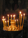 Russia - Velikiy Novgorod: Candles in Orthodox church - photo by J.Kaman