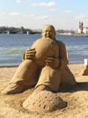 Russia - St Petersburg: Sand sculptures on Neva embankment - holding the Earth and kicking the Moon  - photo by J.Kaman