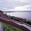 Nizhny Novgorod (former Gorky), Russia: view over the kremlin wall and steps down to Volga River - harbour and the confluence of Oka and Volga Rivers (Strelka) - photo by A.Harries