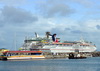 Basseterre, Saint Kitts island, Saint Kitts and Nevis: tour boat and the cruise ships Carnival Fascination and Freedom of the Seas at Zante Port, the cruise dock - photo by M.Torres