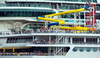 Basseterre, Saint Kitts island, Saint Kitts and Nevis: passengers enjoy the slides at Carnival Fascination's on-board water park - cruise ship Freedom of the Seas in the background, at Zante Port - photo by M.Torres