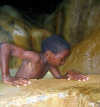 St Lucia: boy in La Soufrire Sulphur Springs, known as 'worlds only drive-in volcano' - La Soufrire volcano - photo by P.Baldwin
