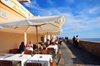 Alghero / L'Alguer, Sassari province, Sardinia / Sardegna / Sardigna: al fresco restaurant at Mirador d'Encamp, on the sea wall near Via Manno - La Muralla - photo by M.Torres