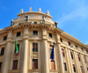 Cagliari, Sardinia / Sardegna / Sardigna: Carabinieri regional HQ on Via Sidney Sonnino - neo-classical architecture with decorative statues - elegant Mussolini period building designed by the engineers Angelo Binagli and Flavio Scano - bronze sculptures by Albino Manca - male nudes symbolizing The Fascist era, Justice, The New Youth, Duty - 'Pro patria contra omnes  Pro me contra neminem' - Carabinieri Comando Regione - Legione dei Carabinieri - piazza Gramsci - quartiere di Villanova - photo by M.Torres