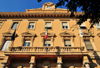 Cagliari, Sardinia / Sardegna / Sardigna: central post office - Piazza del Carmine - porch supported by four Tuscan columns - projecting cornice with a parapet and central pediment - Palazzo delle Poste e Telegrafi - quartiere di Stampace - photo by M.Torres